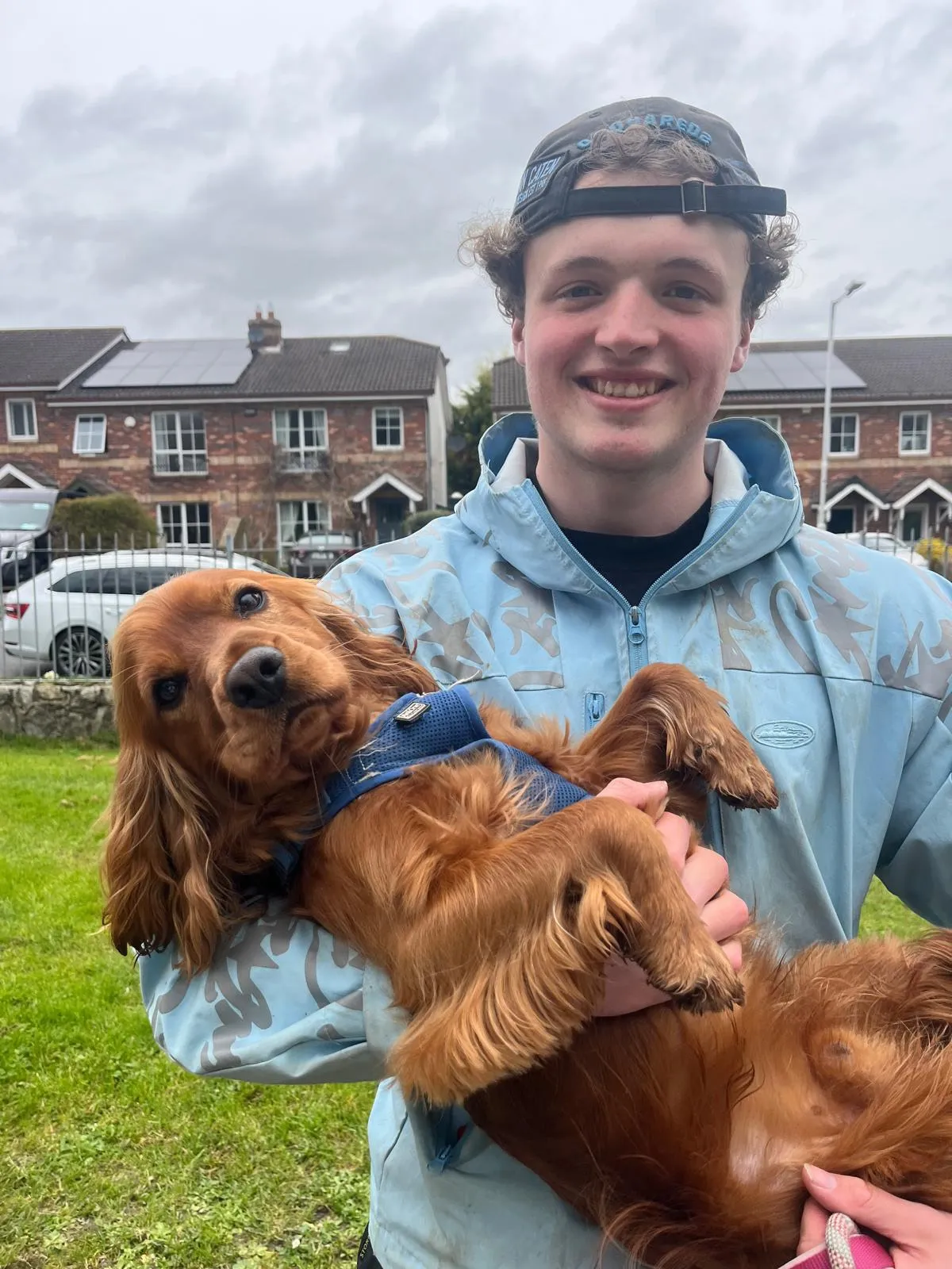 Paul holding a dog